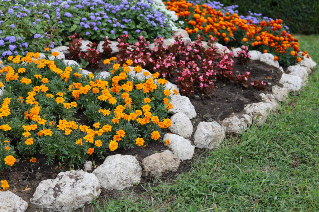 Stone borders make for a beautiful custom flower bed design in your Roanoke, VA, home.
